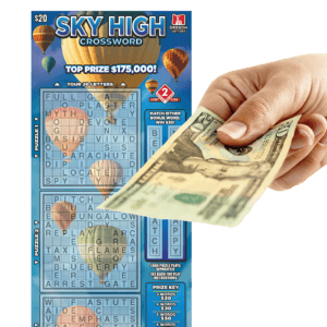 Sky High Crossword Scratch-it is in the background. In the foreground is a hand reaching out holding a $20 bill
